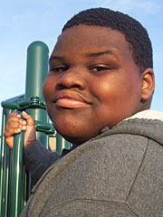 photo of boy on playground